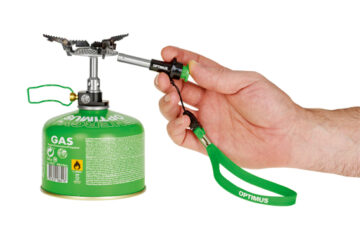 8018914_crux-lite-piezo_male-hand_with-lanyard Optimus Crux Lite Piezo